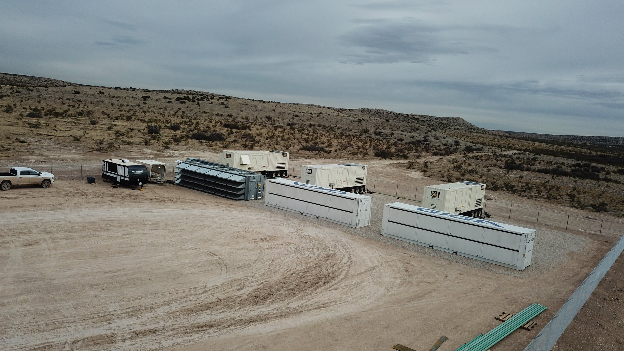 Canoe field site: on-site generation and modular containers on a West Texas pad.